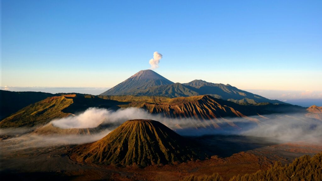 brown and black mountain under blue sky during daytime